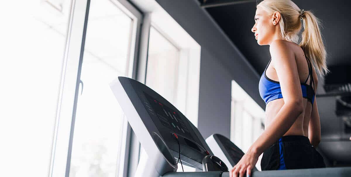 woman working out on a quiet treadmill