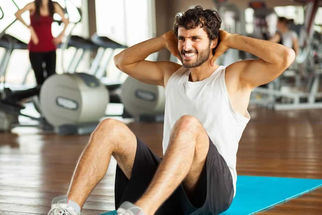 guy at the gym doing sit-up