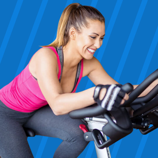 Woman working out on exercise bike