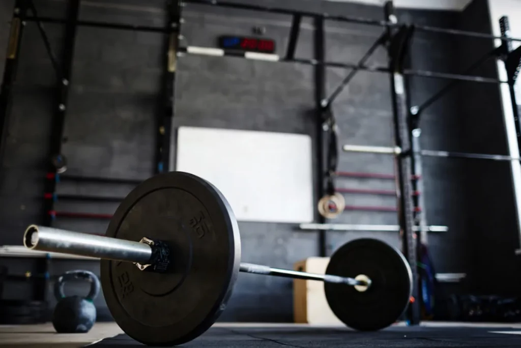 gym with barbell weight set on the floor