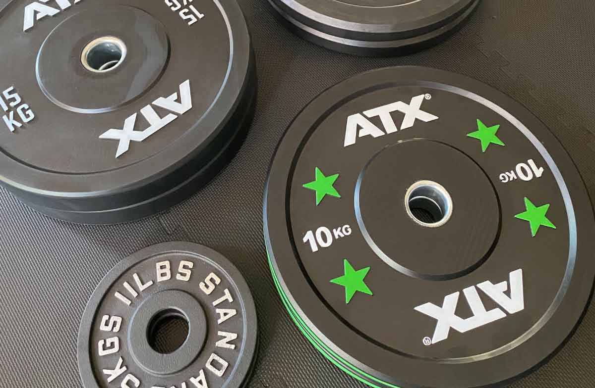 Bumper Plates vs. Iron Plates: The Main Differences