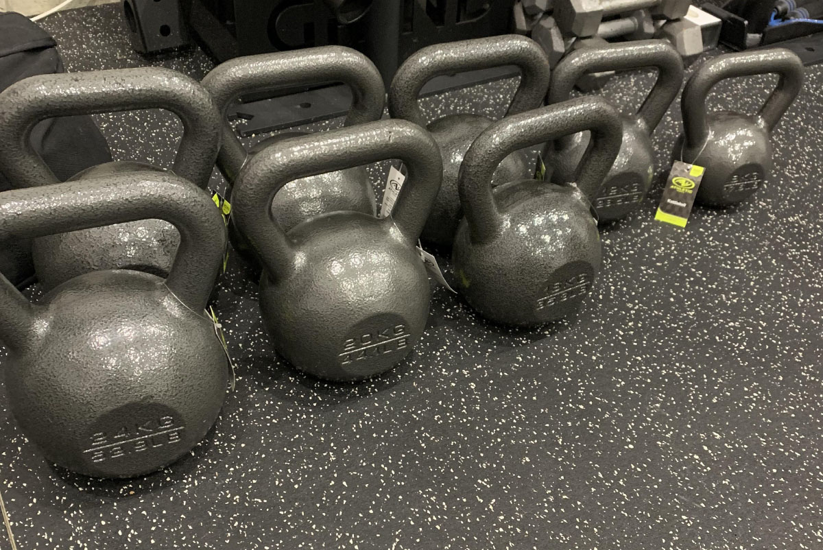 Different size of kettlebells on the floor